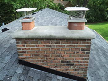 Completed Crown and Chimney Repair with Two new Stainless Steel Chimney Caps