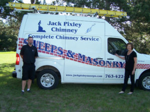 Jack Pixley Sweep Owners Standing in Front of Service Truck