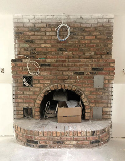 Brick surround with a semi-circle hearth and firebox