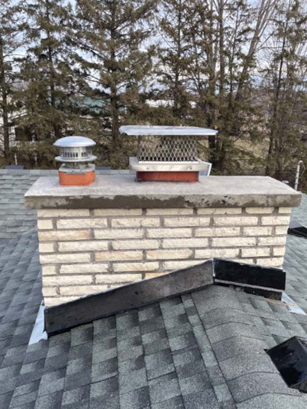 Orginial Photo- Chimney Restoration After- Jack Pixley Sweeps Grey brick chimney after